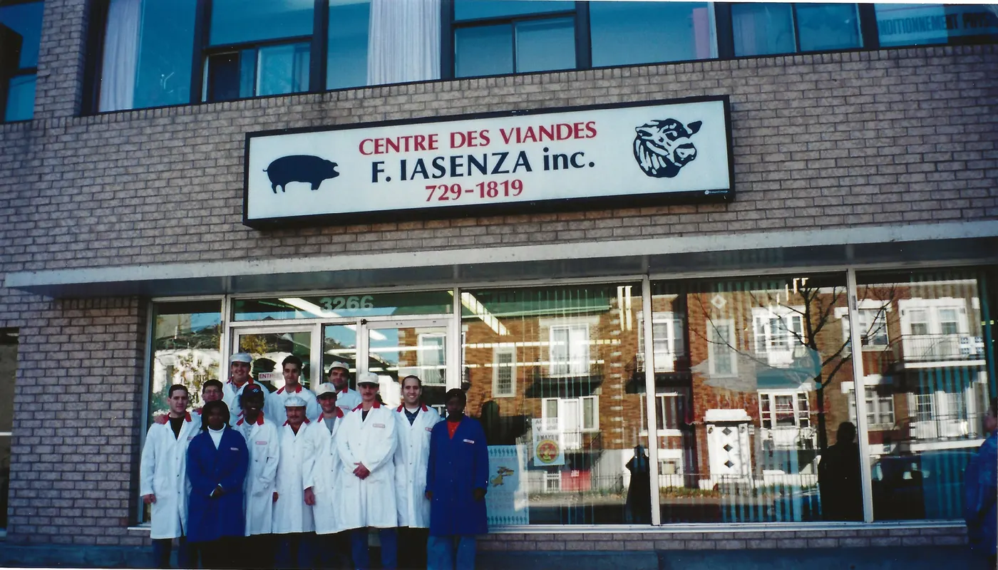 The Iasenza team in white coats outside the Bélanger Street store front