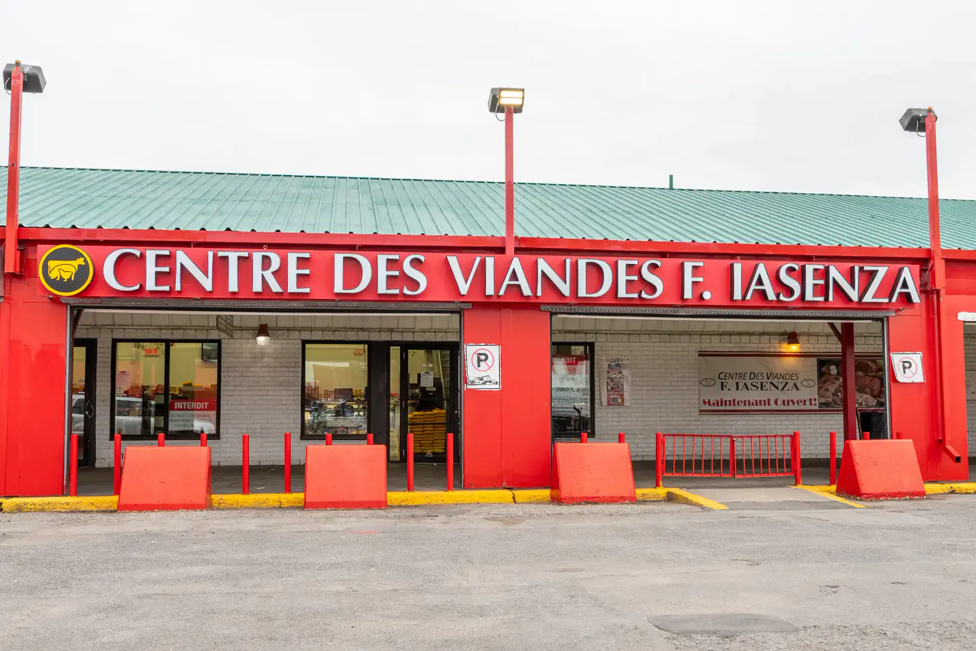 Red storefront of the Laval store with the Centre des Viandes F. Iasenza sign