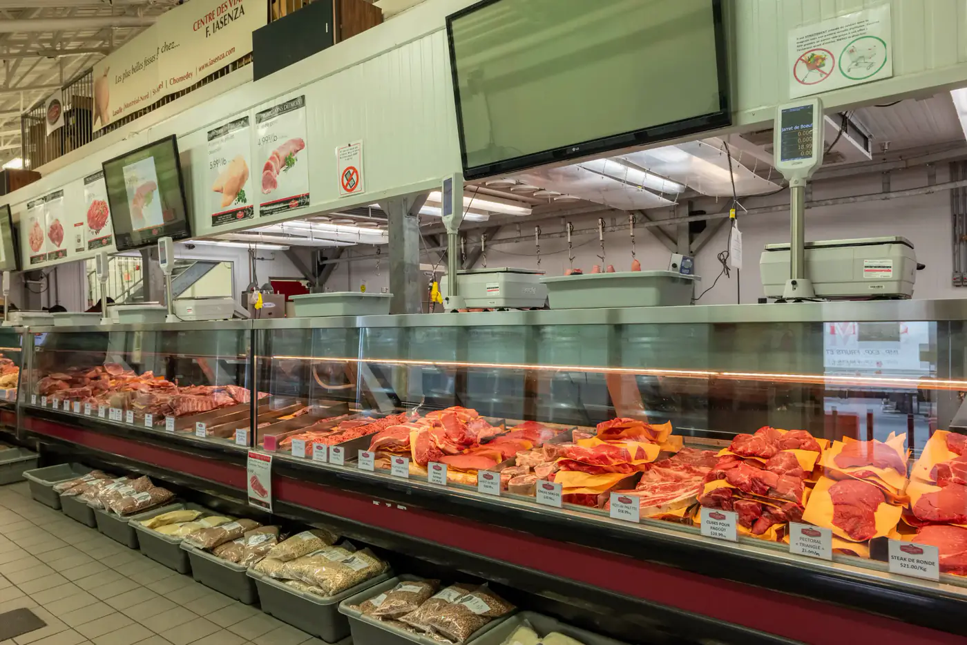 Long refrigerated meat counter at the Laval store