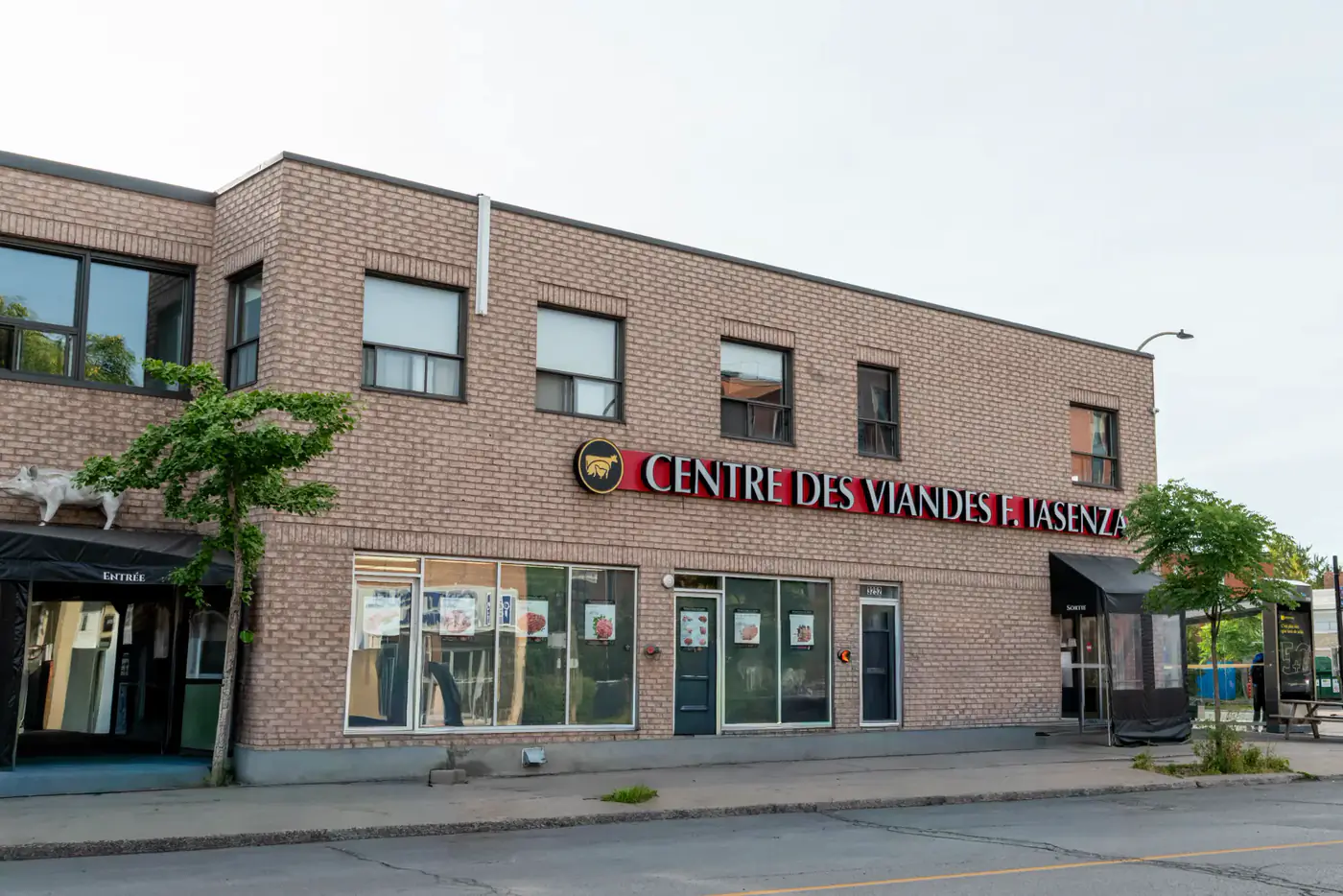 Brick storefront of the St-Michel store with the Centre des Viandes F. Iasenza sign