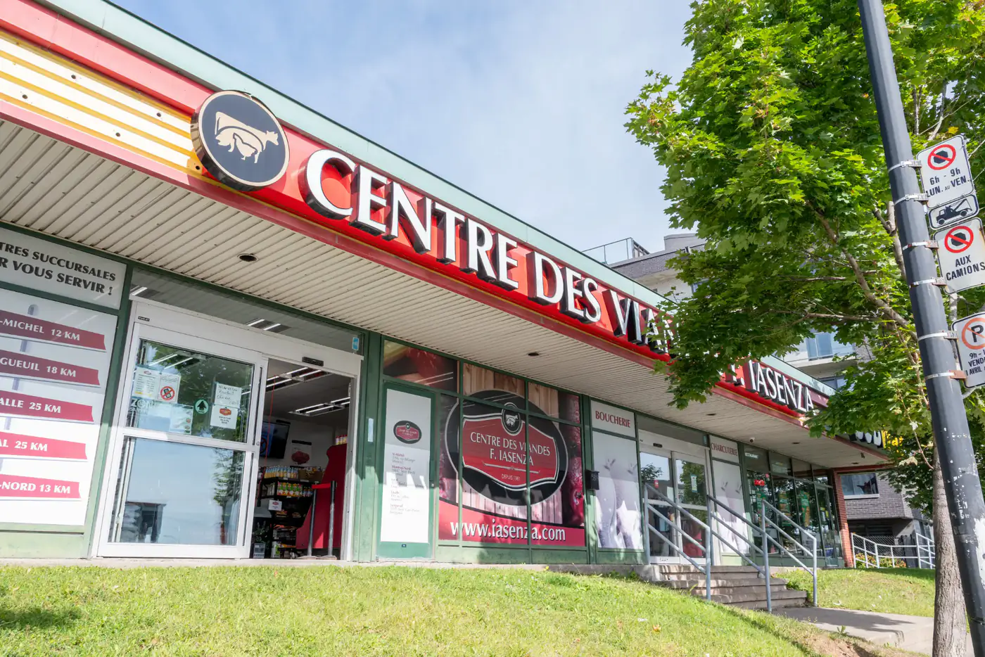 Front of the Tétreaultville store with the large red Centre des Viandes F. Iasenza sign